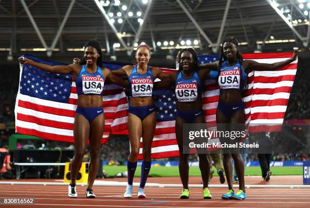 Aaliyah Brown, Allyson Felix, Morolake Akinosun and Ariana Washington of the United States celebrate winning gold in the Women's 4x100 Metres Final...