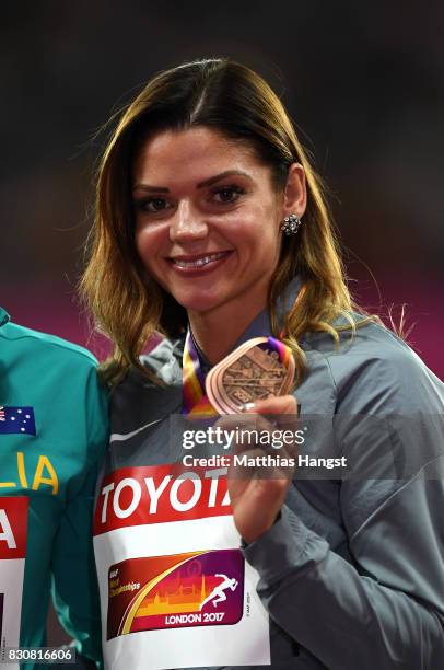 Pamela Dutkiewicz of Germany, bronze, poses with her medal for the Women's 100 metres hurdles during day nine of the 16th IAAF World Athletics...