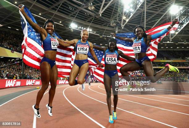Aaliyah Brown, Allyson Felix, Morolake Akinosun and Tori Bowie of the United States celebrate winning gold in the Women's 4x100 Metres Final during...
