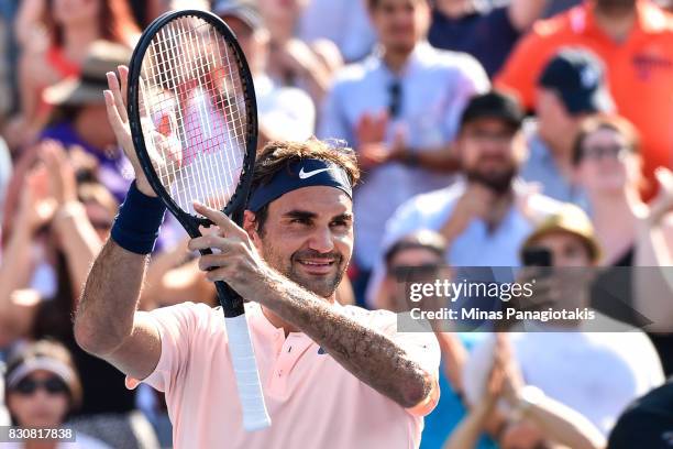Roger Federer of Switzerland celebrates his 6-3, 7-6 victory over Robin Haase of Netherlands during day nine of the Rogers Cup presented by National...