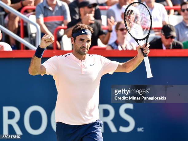 Roger Federer of Switzerland celebrates his 6-3, 7-6 victory over Robin Haase of Netherlands during day nine of the Rogers Cup presented by National...