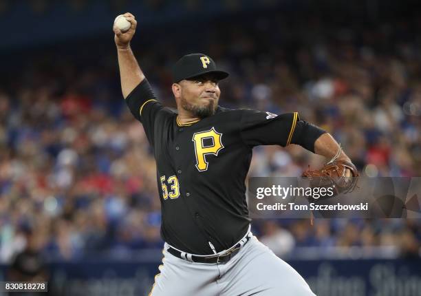 Joaquin Benoit of the Pittsburgh Pirates delivers a pitch in the seventh inning during MLB game action against the Toronto Blue Jays at Rogers Centre...