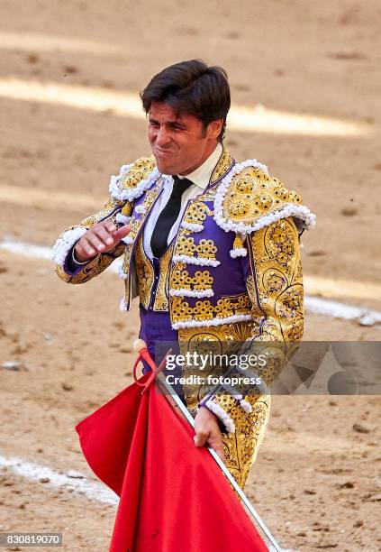 Spanish bullfighter Francisco Rivera Ordonez 'Paquirri' reacts after being a hit during a bullfighting as part of the La Peregrina Festival at Plaza...