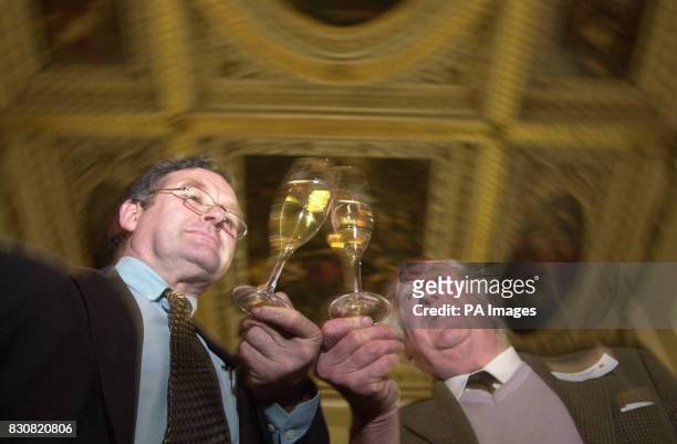 Michael Parrish and David Hoppit sample champagne at the Banqueting House in London's Whitehall, at what organisers claimed was the world's largest...