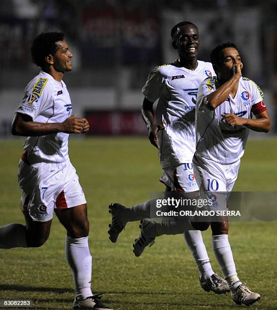 Honduran Danilo Turcios and Samir Arzu and Rony Morales of Olimpia celebrate a goal against of Impact of Montreal, Canada, during a Concacaf...