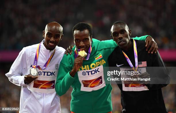 Muktar Edris of Ethiopia, gold, Mohamed Farah of Great Britain, silver and Paul Kipkemoi Chelimo of the United States, bronze pose with their medials...