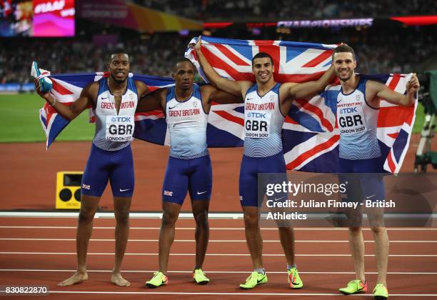 Chijindu Ujah, Adam Gemili, Daniel Talbot and Nethaneel Mitchell-Blake of Great Britain celebrate winning gold in the Men's 4x100 Relay final during...