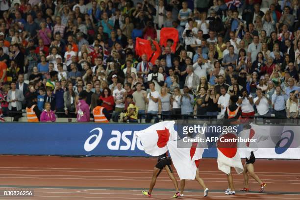 The bronze medal winning Japanese team of Japan's Shuhei Tada, Shota Iizuka, Yoshihide Kiryu and Kenji Fujimitsu celebrate after coming third in the...