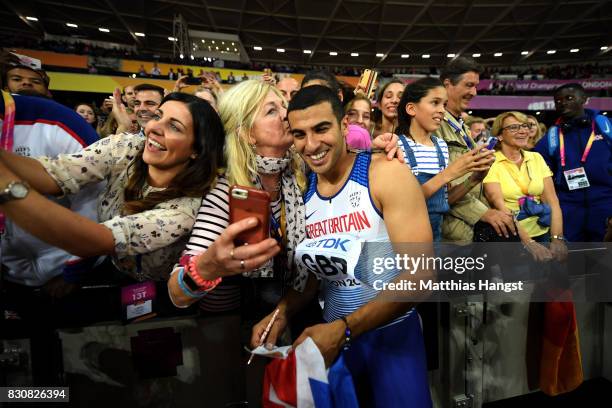 Adam Gemili of Great Britain celebrates winning gold in the Men's 4x100 Relay final during day nine of the 16th IAAF World Athletics Championships...