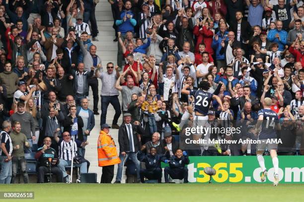 Ahmed Hegazy of West Bromwich Albion celebrates after scoring a goal to make it 1-0 during the Premier League match between West Bromwich Albion and...