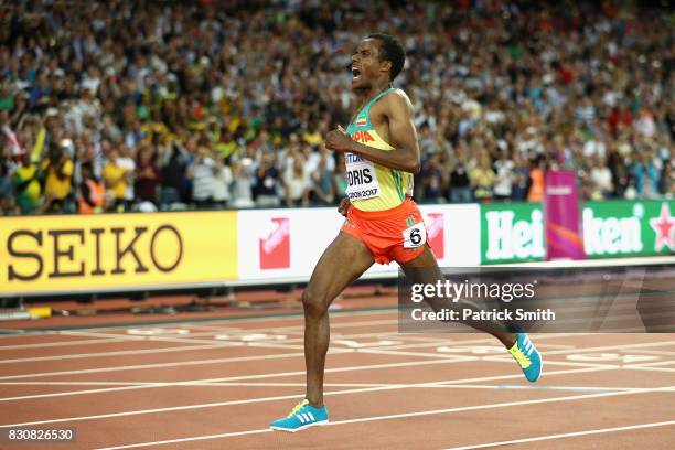 Muktar Edris of Ethiopia celebrates as he crosses the finishline in the Men's 5000 Metres final during day nine of the 16th IAAF World Athletics...