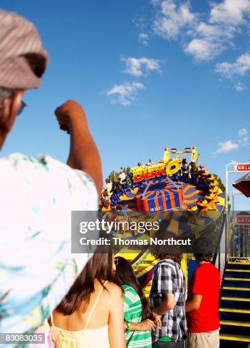 Watching The Rides People Watching Amusement Park Ride High-Res Stock Photo - Getty Images