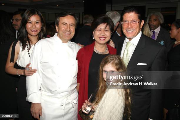 Winnie Madhavan, Chef Daniel Boulud, President of Raffle Hotels & Resorts Diana Ee Tan, Valentina Ruderman and Carl Ruderman attend the Raffles...