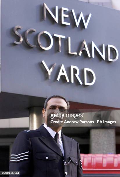 Sergeant Gurpal Virdi who was falsely accused of sending racist hate mail, stands outside the headquarters of the Metropolitan Police in London, as...