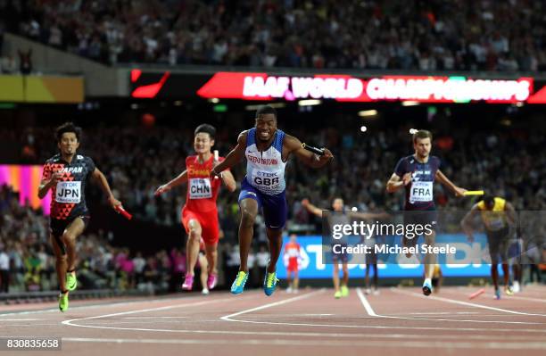 Nethaneel Mitchell-Blake of Great Britain crosses the finishline to win gold in the Men's 4x100 Relay final during day nine of the 16th IAAF World...