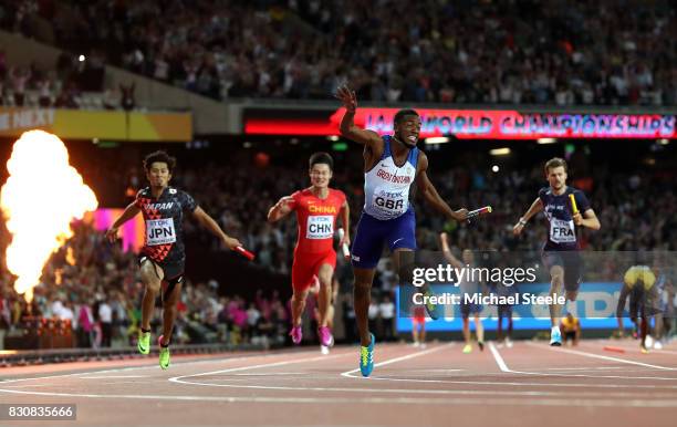 Nethaneel Mitchell-Blake of Great Britain crosses the finishline to win gold in the Men's 4x100 Relay final during day nine of the 16th IAAF World...