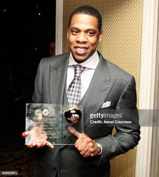 Rapper and entrepreneur Shawn "Jay-Z" Carter poses with his Global Leadership Award at the 2008 Global Leadership Awards gala at the Waldorf-Astoria...