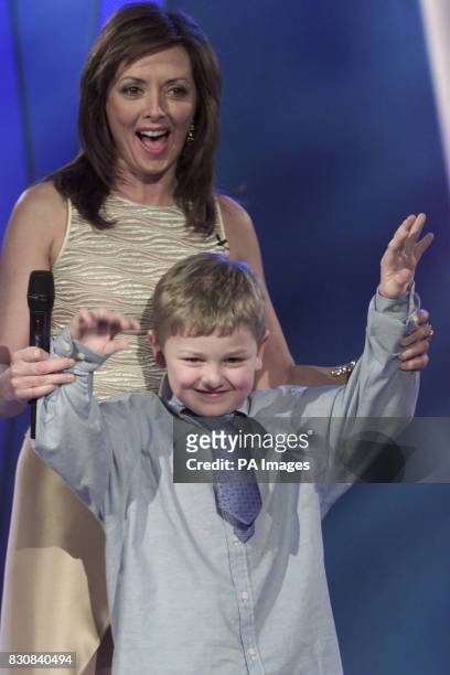 Pride of Britain Awards 2002, Carol Vorderman with Joseph Anderson, who received the child courage award, which took place at the Hilton Hotel in...