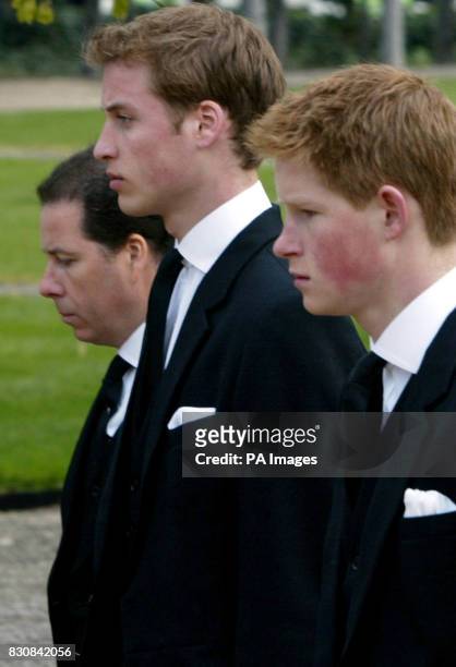 Viscount Linley, Prince William and Prince Harry walk in the funeral procession for their great-grandmother Queen Elizabeth, the Queen Mother outside...