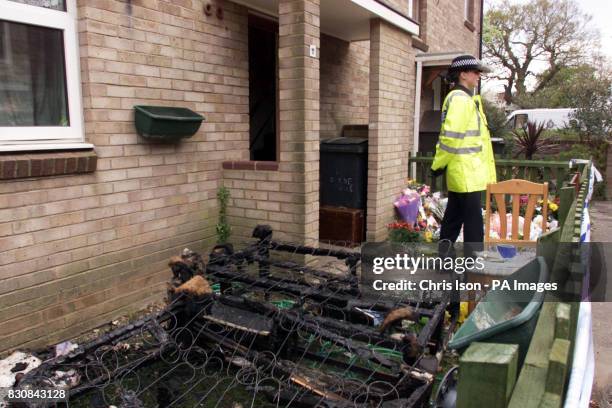 Dorset Police officer outside the home of Tracey Gallagher in Bournemouth, after three of her four children died in a fire which destroyed the...