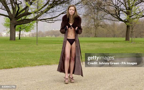 Charlotte Stewart-Brown a student from London and a debutante model from 1999, shivers during a photcall to publicise this year's debutantes season...