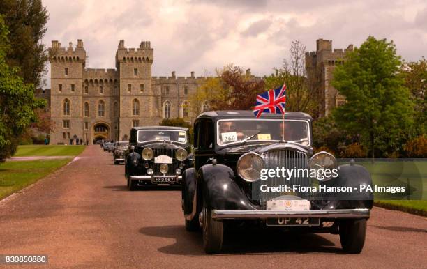 Rolls Royce oweners take part in a Golden Jubilee Tribute rally at Windsor Castle. Along with the Duke of Edinburgh, the Queen reviewed a parade of...