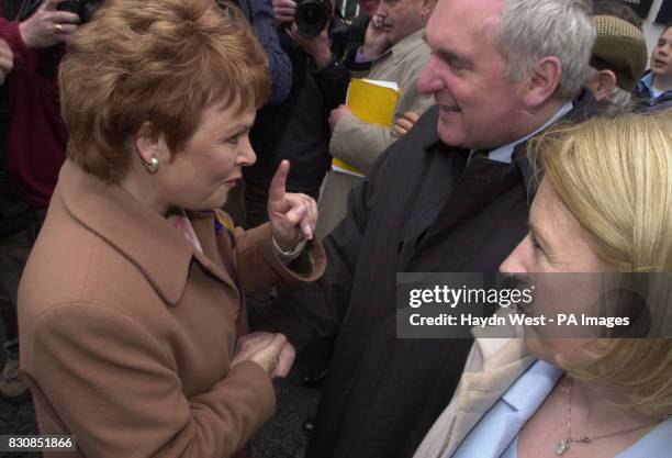 Irish Taioseach Bertie Ahern with Margaret Cox the local Fianna Fail candidate during a walkabout, for his election campaign in Galway is confronted...