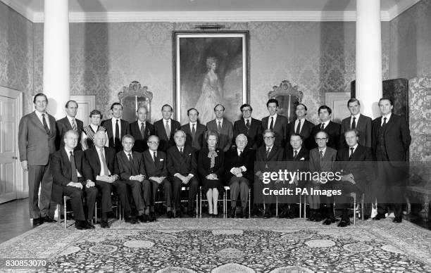 The Cabinet, Mr William Whitelaw seated next to the Prime Minister Margaret Thatcher. The full Conservative Cabinet line up. Front Row L-R: Peter...