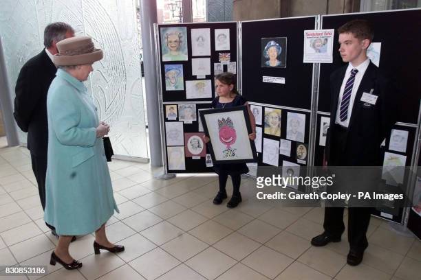The Queen meets picture competition winners Emma Howlett and David Lowther at the Winter Gardens, Sunderland. The Queen arrived in Sunderland today...