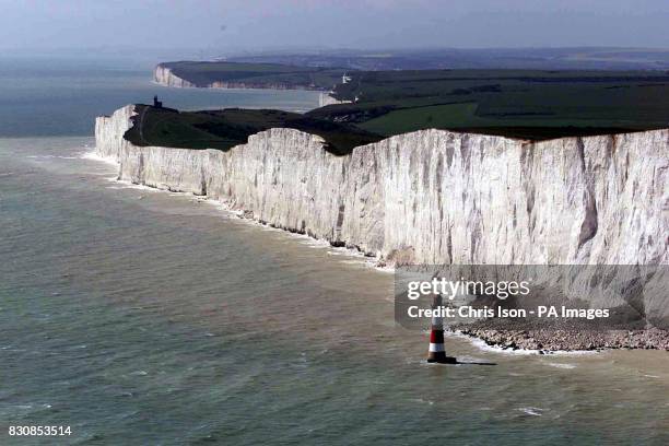 Aerial view of the Lighthouse and cliffs at Beachy Head in East Sussex incl the Belle Tout lighthouse in the distance. 18/01/04: A man was repeatedly...