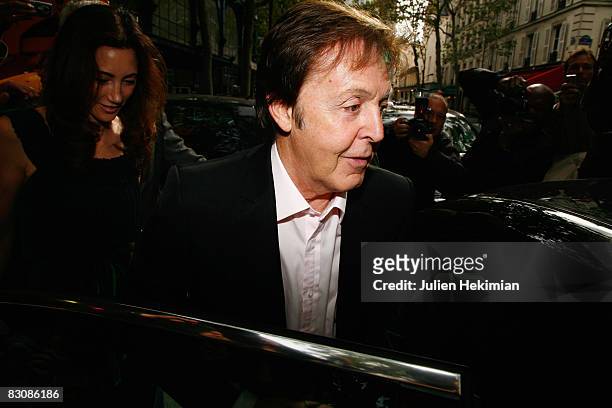 Sir Paul McCartney leaves the Stella McCartney fashion show during Paris Fashion Week at Carreau du Temple on October 02, 2008 in Paris, France.