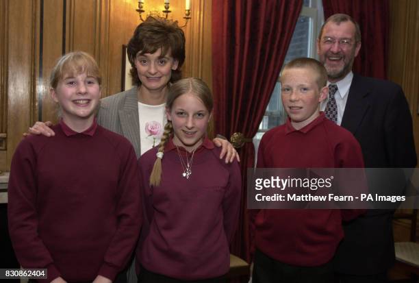 Cherie Blair, wife of Britain's Prime Minister Tony Blair, meets Lucy McLean, Stephanie Gaunt, Steven Harrison and Leeds West MP John Battle at...