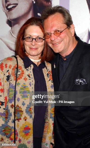 Terry Gilliam and his wife Maggie Weston arrive for a celebrity gala screening of 'High Society' at the Odeon West End in London.