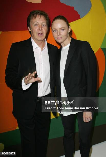 Paul McCartney and Stella McCartney pose together at the Stella McCartney fashion show during Paris Fashion Week at Espace Ephemere Tuilerieson on...