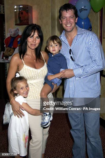 Former Page Three model Linda Lusardi with her husband, actor Sam Kane, and their children Lucy, and Jack at a screening of the new film 'Stuart...