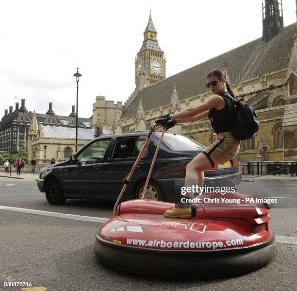 Tiziana Fracchiolla, a 26 year old professional dancer, uses an Airboard to beat traffic chaos in London caused Thursday, by a 24-hour strike by Tube...