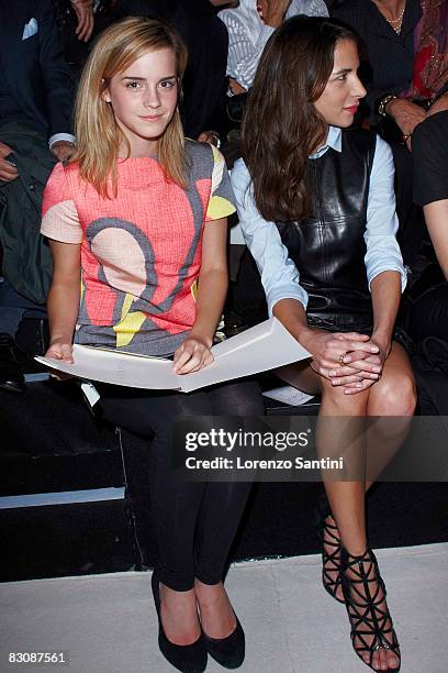 Actress Emma Watson and Caroline Selber at the Giambattista Valli fashion show during Paris Fashion Week at Espace Eiffel on October 2, 2008 in...
