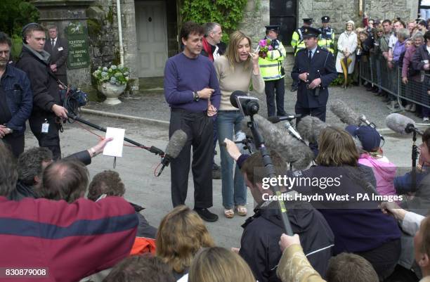 Former Beatle Sir Paul McCartney and his bride Heather Mills pose for photographers, outside Castle Leslie, in Glaslough, County Monaghan, Ireland,...