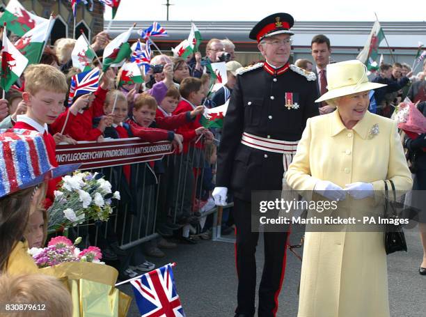 Britain's Queen Elizabeth II walks, on the station at Llanfair PG at the start of her three day Golden Jubilee visit to Wales. She arrived on the...