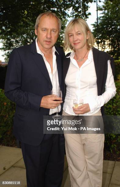 Mark Knopfler and his wife Kitty arriving for a private reception celebrating a major retrospective of the painter Lucian Freud, at Tate Britain in...