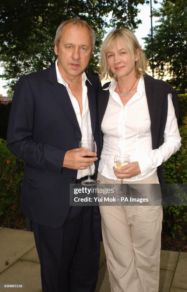 Mark Knopfler and his wife Kitty arriving for a private reception celebrating a major retrospective of the painter Lucian Freud, at Tate Britain in London.  27/11/03: Mark Knopfler and his wife Kitty. Musician Mark Knopfler is celebrating the birth of a baby daughter, it was announced. Katya Ruby Rose was born on Tuesday weighing 9lbs 9oz, Knopfler's spokeswoman said. She is the second child for the star and his third wife, Kitty Aldridge. They already have a five-year-old daughter, Isabella.   (Photo by Yui Mok - PA Images/PA Images via Getty Images)