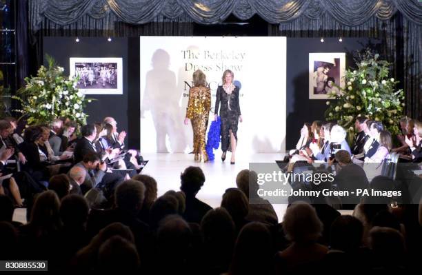 Two former debutante models adorn the catwalk during the 50th Berkeley Dress Show held at The Dorchester Hotel on Park Lane in central London. The...