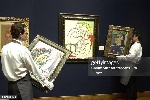 Works by Picasso being hung at Christie's, Le Peintre,Nu au collier and Femme au chapeau, three of Pablo Picasso's works to be sold at Christie's...