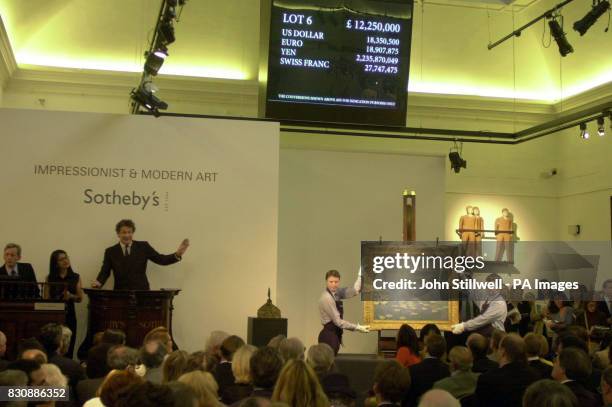 The Nympheas' oil on canvas painting, which was auctioned for 13 650 at Sotheby's in Central London.One of the celebrated series of water-lily...