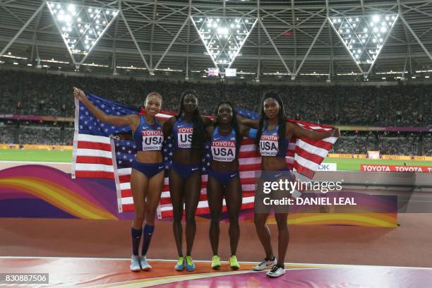 Athletes Aaliyah Brown, Morolake Akinosun, Allyson Felix and Tori Bowie pose with their flag as they celebrate winning the final of the women's...