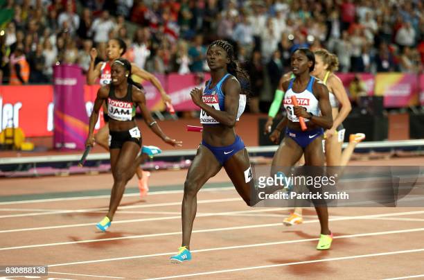 Tori Bowie of the United States crosses the finish line in the Women's 4x100 Metres final during day nine of the 16th IAAF World Athletics...