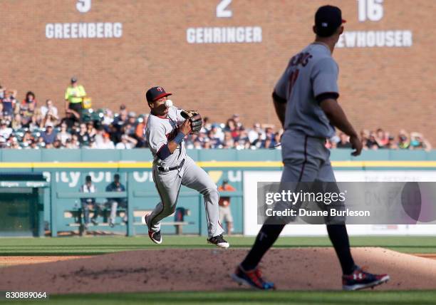 Shortstop Jorge Polanco of the Minnesota Twins bobbles the hit by Nicholas Castellanos of the Detroit Tigers during the first inning at Comerica Park...