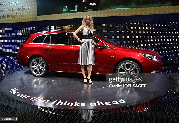 An Opel Insigna is presented during the Paris Motor Show on October 2, 2008. The Paris motor show opened Thursday for the press and industry reps....