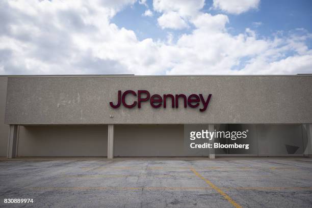 Signage is displayed outside a JC Penney Co. Store in Chicago, Illinois, U.S., on Saturday, Aug. 12, 2017. On Friday morning, JC Penney posted a...