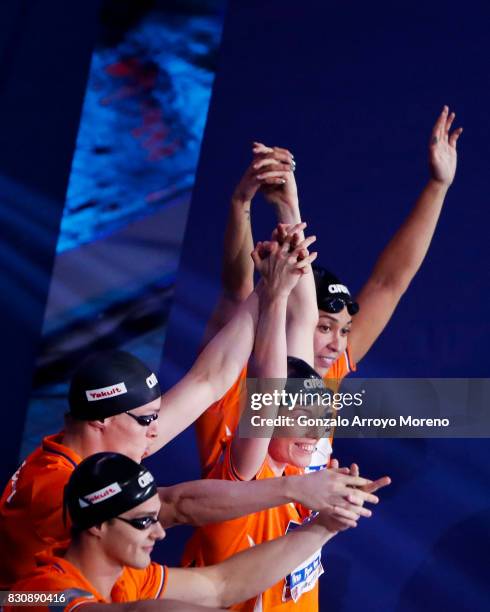 The Netherland«s team Ranomi Kromowidjojo, Femke Heemskerk, Jesse Puts and Thom De Boer waves the audience prior to start the Mixed 4x50m Freestyle...